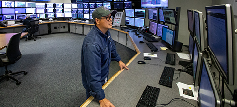 man in control room