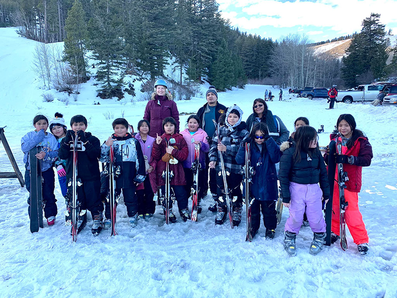 Group of students pose in ski gear