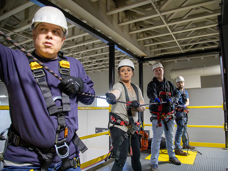 employees doing rope rescue training