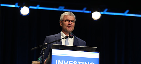 Todd Brickhouse presenting at a podium