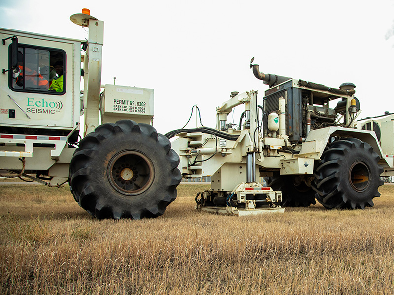 Trucks completing seismic testing